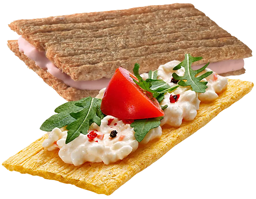 Crackerbread topped with cream cheese, tomato and rocket