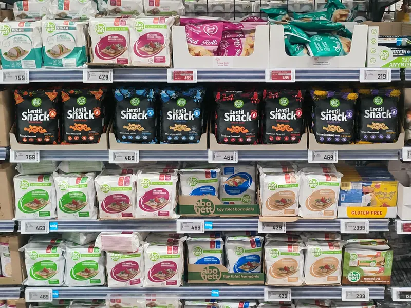 Abonett Lentil Snack bags above crackerbread packs on a supermarket shelf